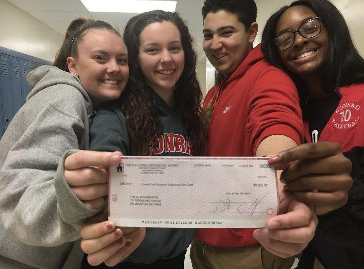 Katie+Dick%2C+Devon+Collazo%2C+Zack+Turner%2C+and+Amiya+Rattley+hold+up+the+check+for+%245%2C000+that+was+given+to+the+B%2B+Foundation%21+