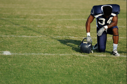 Standing, Sitting, Kneeling, and Tweeting